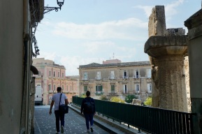 Tourists cross from Ortigia to Siracusa's mainland